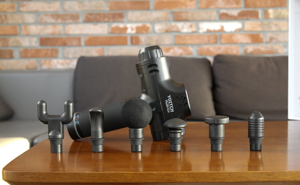 Is a Massage Gun Better Than a Handheld Massager?